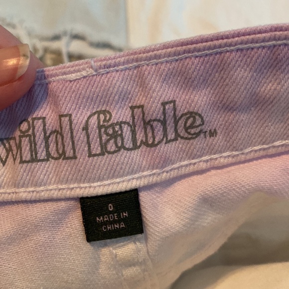 Denim duo shorts and skirt (Levi)  with frayed bottoms. - Picture 3 of 8